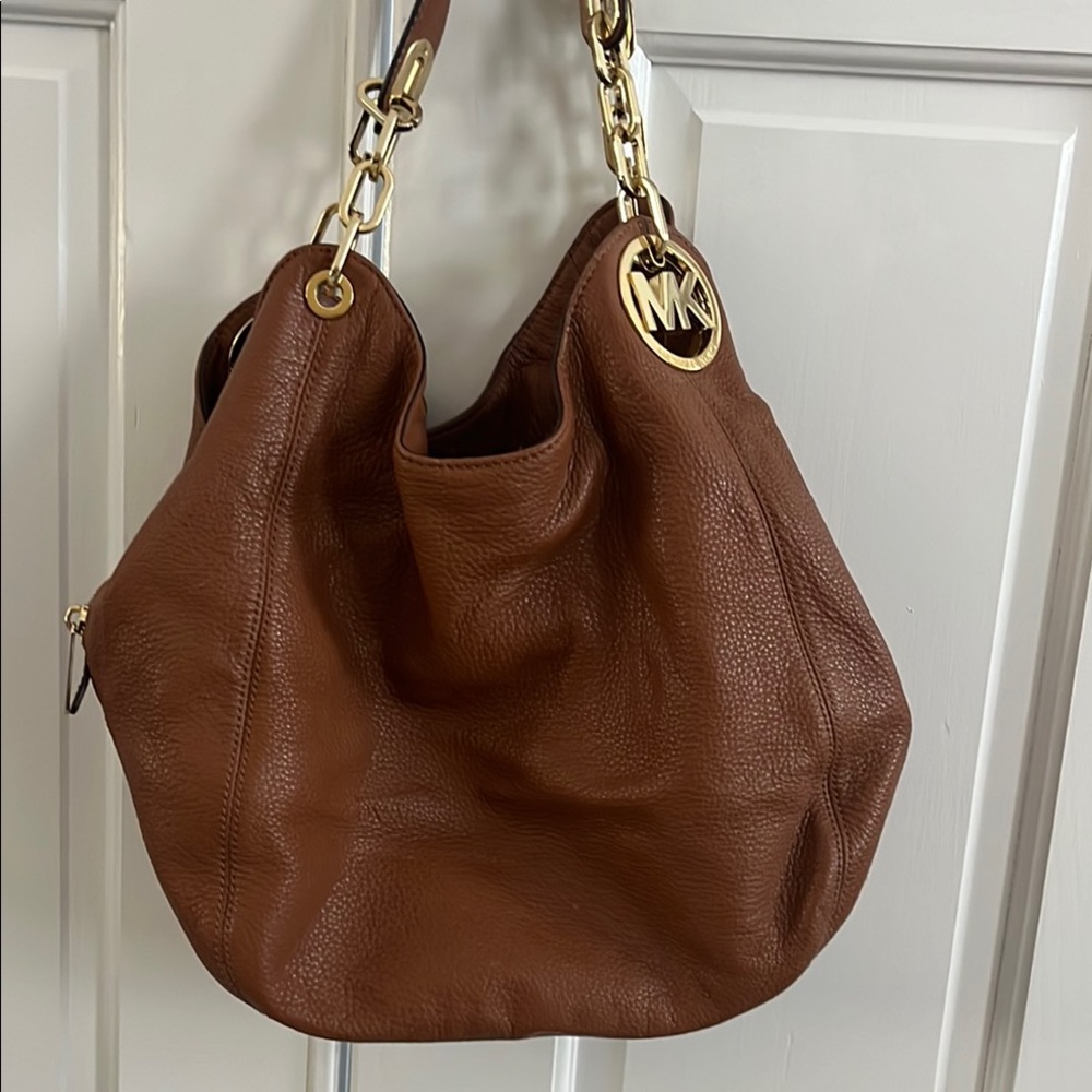 Michael Kors Brown and Gold Hobo Bag with Soft Leather Texture and Roomy Design
